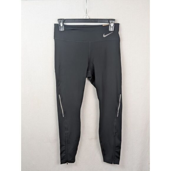 NWT Nike Faster Tight Fit Mid Rise 7/8 with Calf Zip Women's Size Medium - Picture 1 of 13